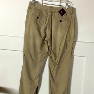 Goodall khakis size 31 waist flat front tapered leg.